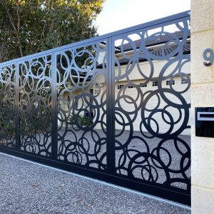 Laser cut sliding gate